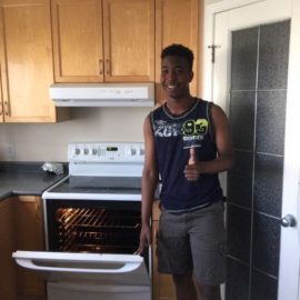 Happy oven repair customer with fixed electric range